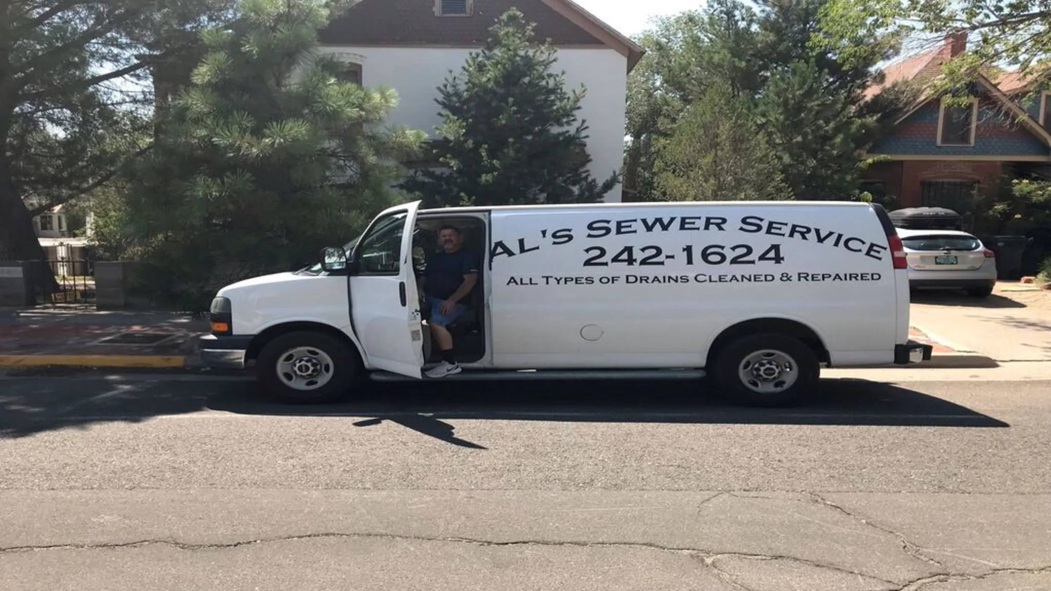 Al's Sewer Service van with technician, Albuquerque NM